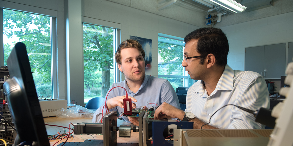 A student being mentored by a professor